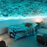 Cueva Thalia - Luxury Cave With Heated Indoor Pool And Garden בית נופש
